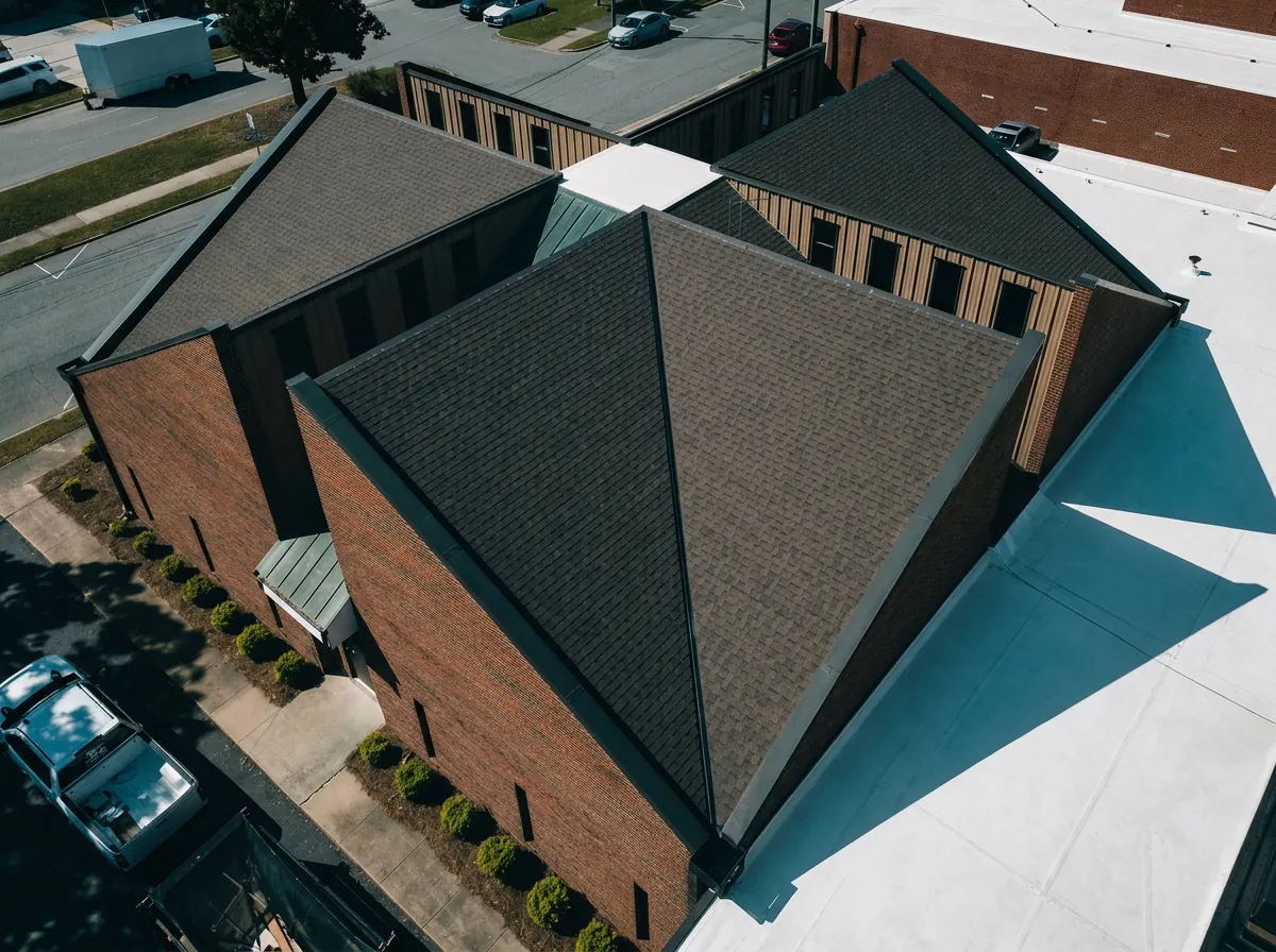 Flat commercial roof with TPO membrane and rooftop HVAC units